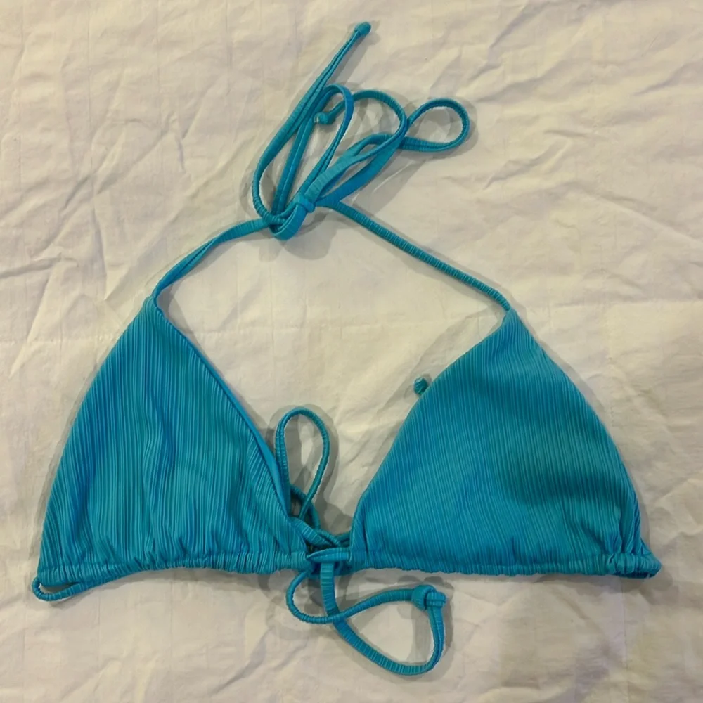 Frankie’s bikinis, blue bikini top size medium